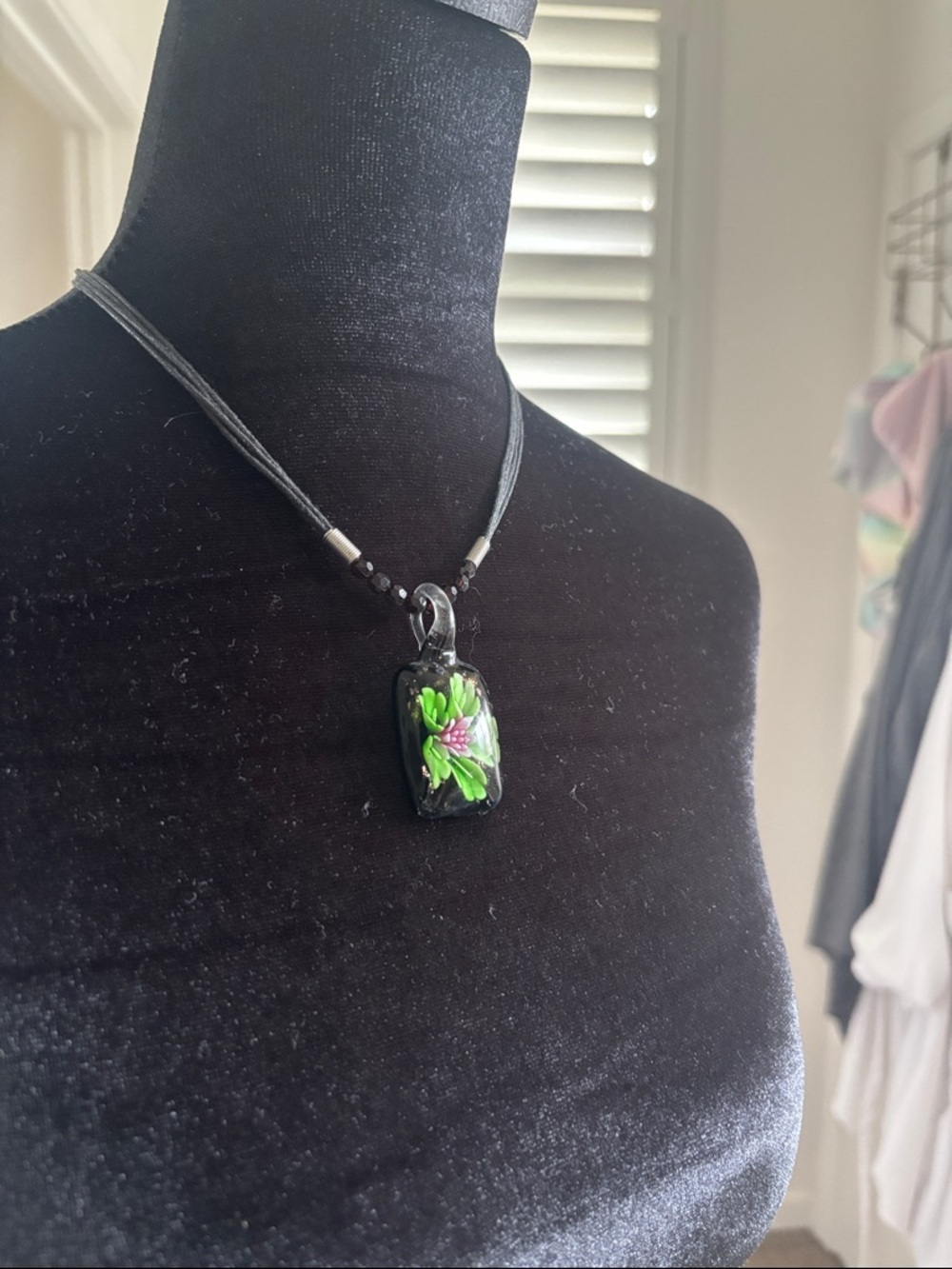 Handmade Black Glass Pendant Necklace with Green Flower Accent